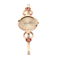 Titan Raga Viva Rose Gold Dial Analog Day and Date Metal Strap Watch for Women